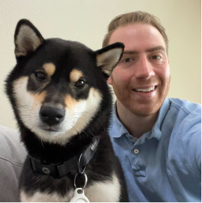 Nick Gulbrandsen, Director of Lab and Facility Operations, and his dog